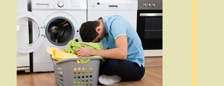 چرا لباس در ماشین لباسشویی سفیدک میزند